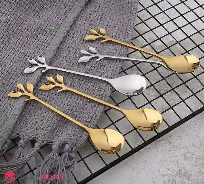 خرید عمده قاشق چای خوری استیل طرح برگ
