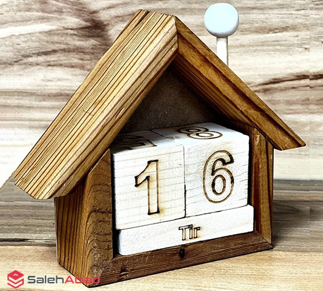 فروش عمده تقویم دکوری چوبی طرح کلبه