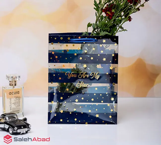 فروش عمده ساک هدیه طلقی طرح راه راه