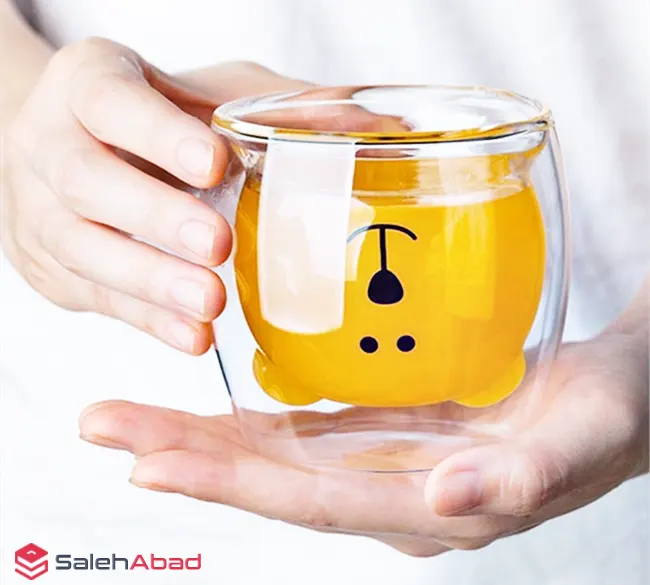 فروش عمده لیوان دوجداره پیرکس طرح خرس لب طلا