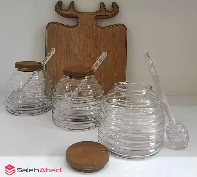 فروش عمده عسل خوری شیشه ای درب چوبی قاشق دار