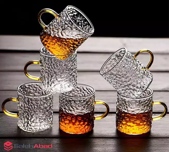 فروش عمده نیم لیوان پیرکس دسته طلایی