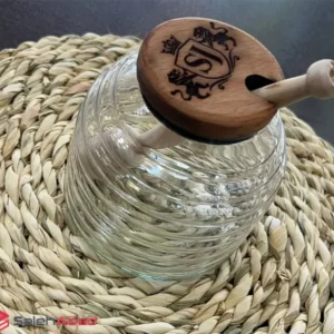 فروش عمده ظرف عسل شیشه ای قاشق چوبی