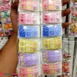 فروش عمده گیره تق تقی دخترانه گلدار