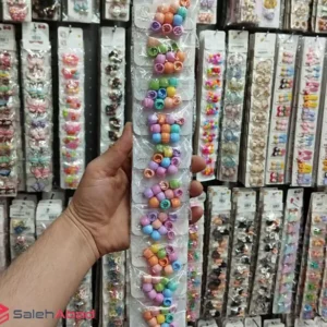 فروش عمده مهره مو دخترانه رنگی