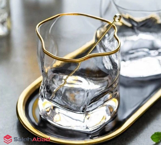 فروش عمده لیوان شیشه ای دفرمه لب طلا