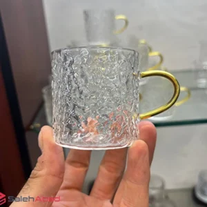 فروش عمده فنجان پیرکس برفی دسته طلایی