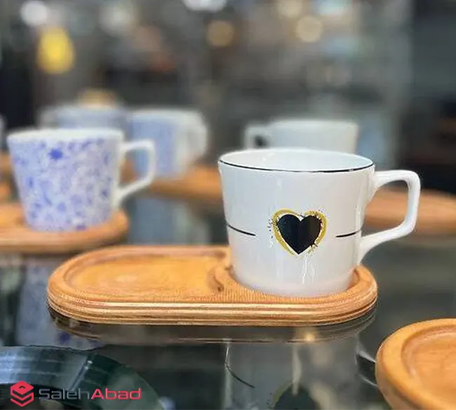فروش عمده فنجان زیر چوبی قلبی دنی هوم