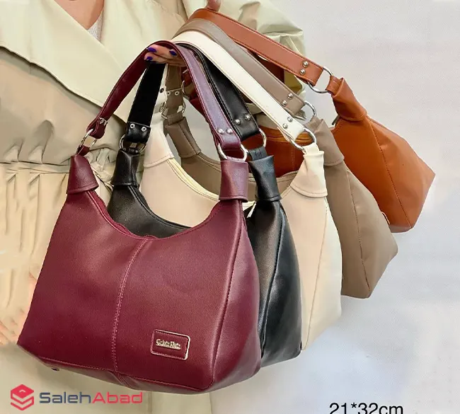 فروش عمده کیف زنانه دوشی چرم رنگی ساده