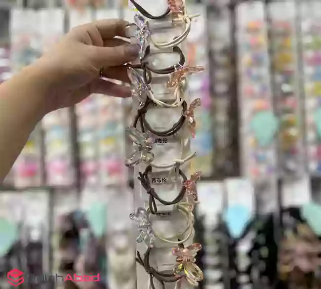 فروش عمده کش مو قیطانی طرح پروانه