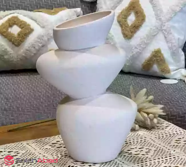 فروش عمده گلدان سرامیکی سفید دفرمه
