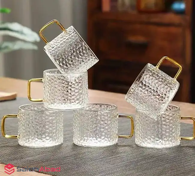 فروش عمده فنجان پیرکس طرح سنگی دسته طلایی
