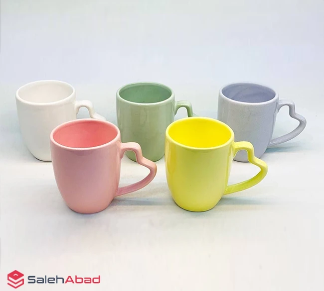 فروش عمده ماگ سرامیک رنگی دسته قلبی